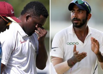 Darren Bravo (L) leaves the field; Jasprit Bumrah