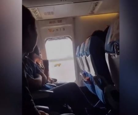 Woman opens plane's emergency exit for fresh air; Video goes viral