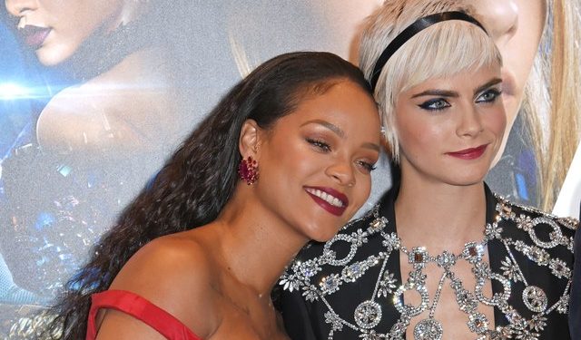 Rihanna (L) and Cara Delevingne