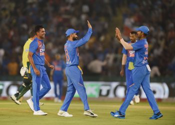 Indian players celebrate the fall of a South African wicket