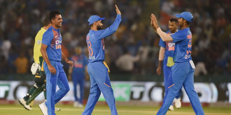 Indian players celebrate the fall of a South African wicket