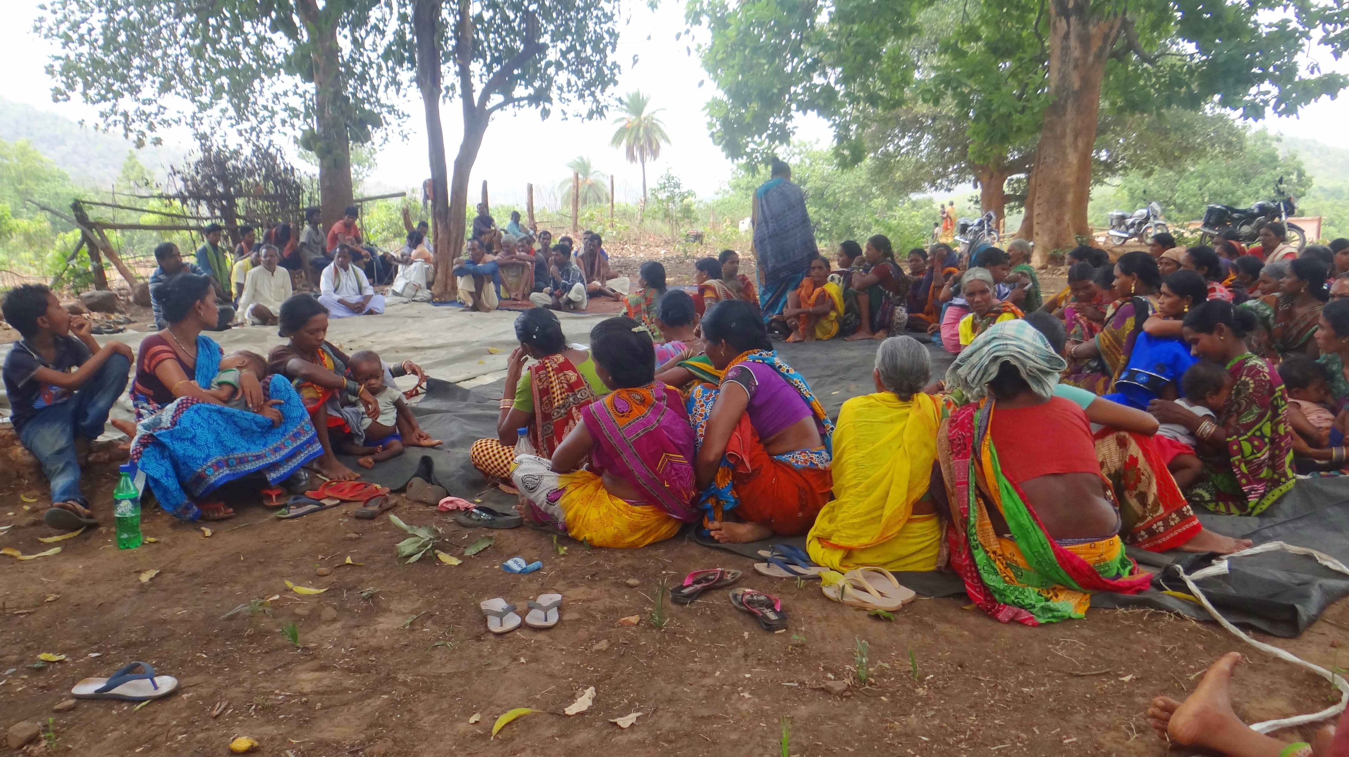 Community members meeting for forest fire