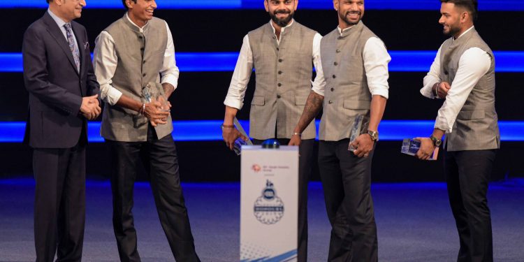 (From Left) DDCA president Rajat Sharma, Navdeep Saini, Virat Kohli, Shikhar Dhawan and Rishabh Pant