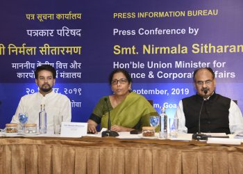 Finance Minister Nirmala Sitharaman address the media at Panaji, Friday. Also seen in the picture are MoS Anurag Thakur (left) and Finance Secretary Ajay Bhusan Pandey