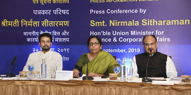 Finance Minister Nirmala Sitharaman address the media at Panaji, Friday. Also seen in the picture are MoS Anurag Thakur (left) and Finance Secretary Ajay Bhusan Pandey