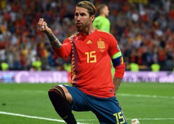 Sergio Ramos celebrates after scoring the opening goal for Spain against Romania