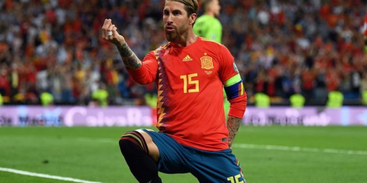 Sergio Ramos celebrates after scoring the opening goal for Spain against Romania