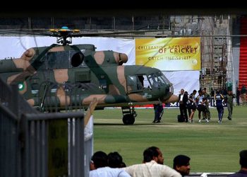 Sri Lankan officials and players prepare to board a helicopter at Gaddafi Stadium after the shooting incident in Lahore, March, 3, 2009. File pic