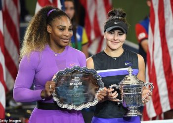 Serena Williams (L and Bianca Andreescu pose with their trophies