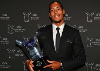 Virgil van Dijk with the UEFA Best Men's Player trophy