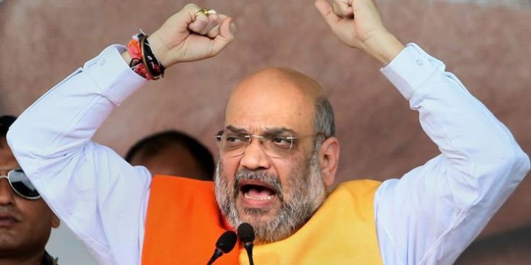Jamtara: BJP national president and Union Home Minister Amit Shah addresses a rally to begin his Jan Ashirvaad Yatra, ahead of the state Assembly elections, in Jamtara, Wednesday, Sept 18, 2019. (PTI Photo)  (PTI9_18_2019_000111A)