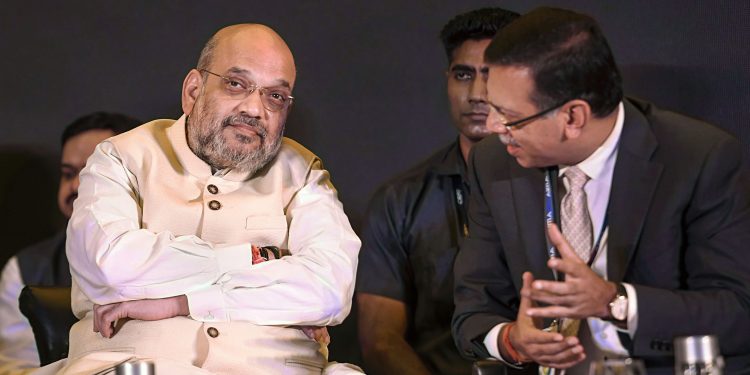 Amit Shah and industrialist Sanjeev Goenka at the function, Tuesday