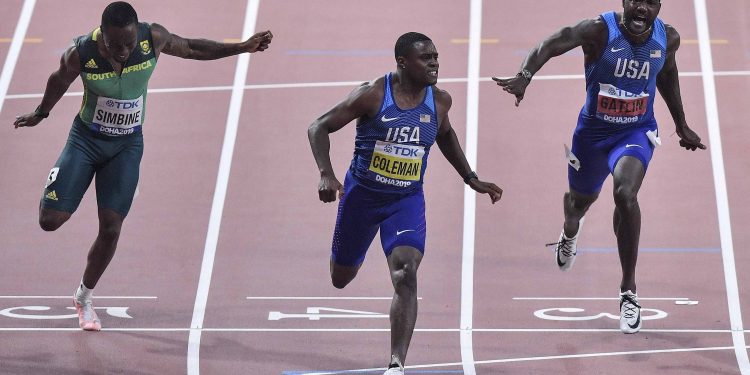 Christian Coleman (Centre) winning the 100m at Doha, Saturday night