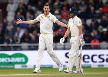 Josh Hazlewood celebrates after dismissing England skipper Joe Root at Old Trafford, Friday