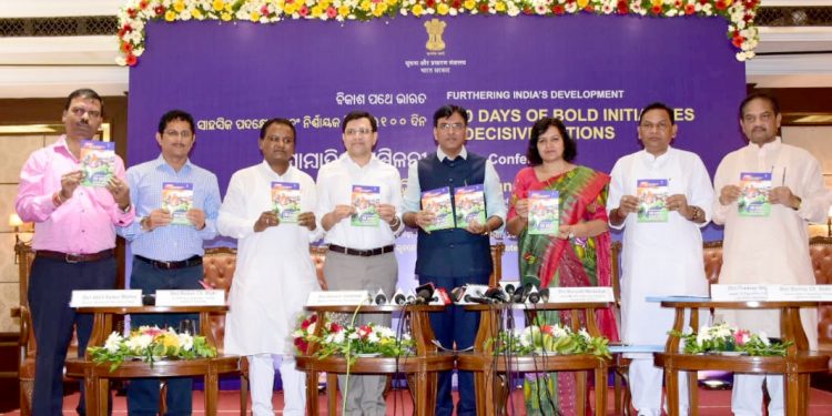 Dignitaries including Union Minister of State for Shipping, Chemicals and Fertilisers Mansukh Mandaviya (fourth from right) and Bhubaneswar MP Aparajita Sarangi releasing a book at Hotel Mayfair in City