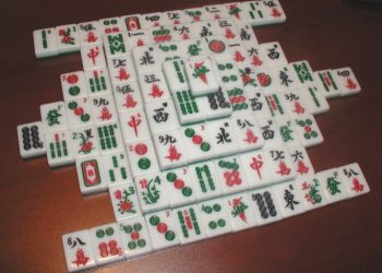 Mahjong is a tile-based game that was developed in China during the Qing dynasty and has spread throughout the world since the early 20th century.