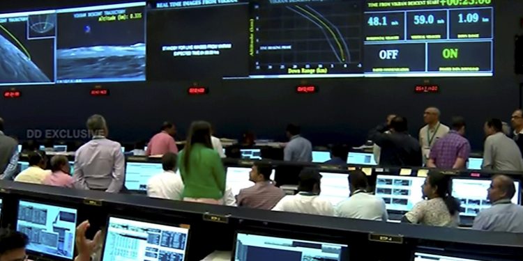 Officials of ISRO watching giant screen to track the landing of Vikram