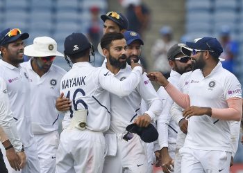Pune: Indian cricket team players celebrate their victory during the day 4 of second India-South Africa cricket test match