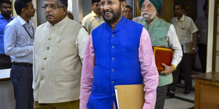 New Delhi: Union Ministers Ravi Shankar Prasad, Prakash Javadekar and Minister of Housing and Urban Affairs Hardeep Singh Puri arrive to address a press conference on cabinet decisions, in New Delhi, Wednesday, Oct. 23, 2019. (PTI Photo/Subhav Shukla)(PTI10_23_2019_000124B)