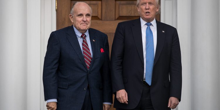 Rudy Guiliani (L) and Donald Trump