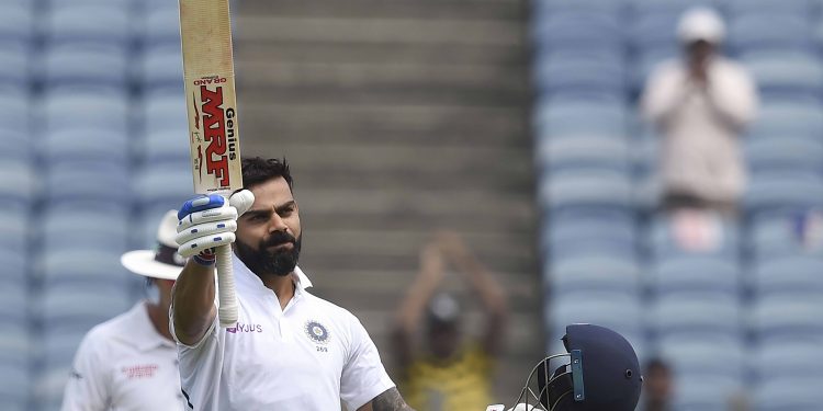 Virat Kohli acknowledges the applause after reaching his century against South Africa