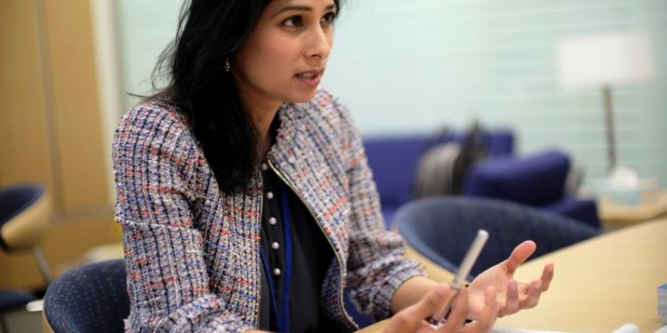 FILE PHOTO: IMF Chief Economist Gita Gopinath speaks in her office during the Spring Meetings of the World Bank Group and IMF in Washington, U.S., April 11, 2019. REUTERS/James Lawler Duggan