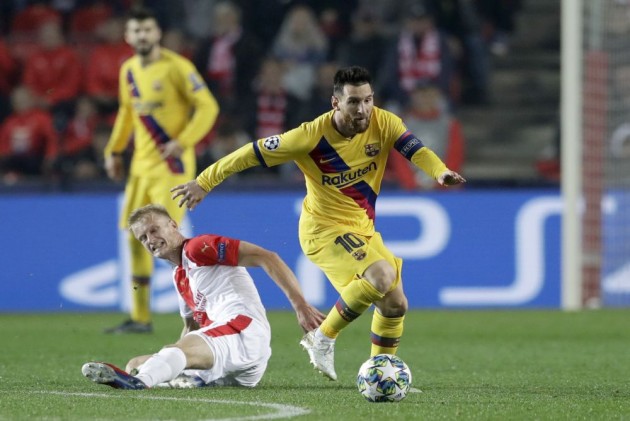 Messi's historic goal helps Barcelona edge Slavia Prague