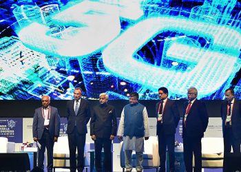 Top dignitaries at the Indian Mobile Congress pose with Telecom Minister Ravi Shankar Prasad
