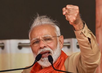 Prime Minister Narendra Modi  addresses an election campaign rally ahead of Haryana Assembly elections, in Charkhi Dadri, Tuesday