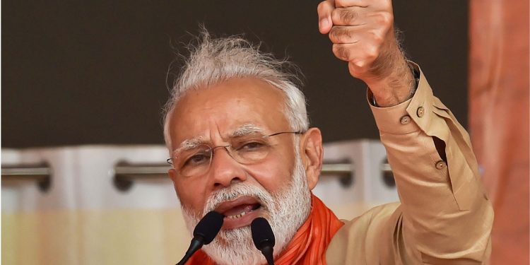 Prime Minister Narendra Modi  addresses an election campaign rally ahead of Haryana Assembly elections, in Charkhi Dadri, Tuesday