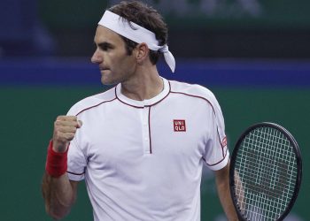 Roger Federer is pumped up after winning a point against David Goffin