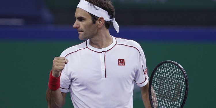 Roger Federer is pumped up after winning a point against David Goffin