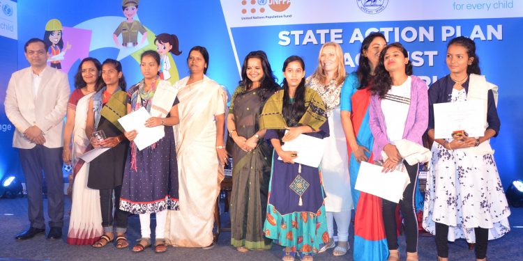Women and Child Development Minister Tukuni Sahu and other dignitaries with the survivors of child marriage OP Photo