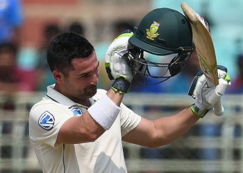 South African cricketer Dean Elgar raises his bat after scoring 100 runs during the third day's play of the first Test match between India and South Africa at the Dr. Y.S. Rajasekhara Reddy ACA-VDCA Cricket Stadium in Visakhapatnam on October 4, 2019. (Photo by NOAH SEELAM / AFP) / ----IMAGE RESTRICTED TO EDITORIAL USE - STRICTLY NO COMMERCIAL USE----- / GETTYOUT