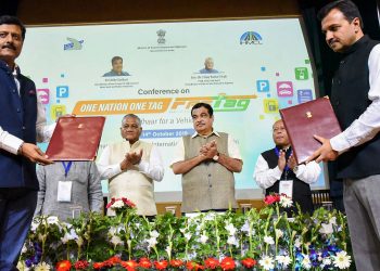 Union Minister for Road Transport and Highways and Micro, Small and Medium Enterprises, Nitin Gadkari witnessing the exchange of the agreements, at the inauguration of the Conference on One Nation One Fastag, in New Delhi, Monday