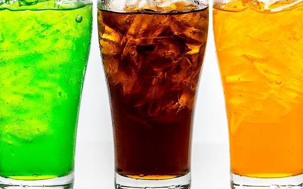 Soft drinks linked to obesity, tooth wear