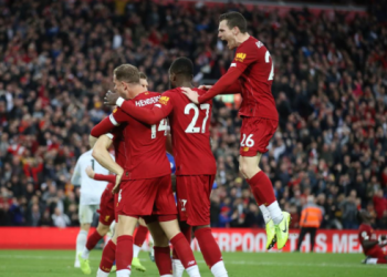 Liverpool v Leicester City - Anfield, Liverpool, Britain - October 5, 2019 Liverpool's James Milner celebrates scoring their second goal with Andrew Robertson and team mates Action Images via Reuters/Carl Recine