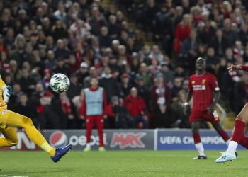 Mohamed Salah (right) shoots to score the winning goal against Salzburg, Wednesday