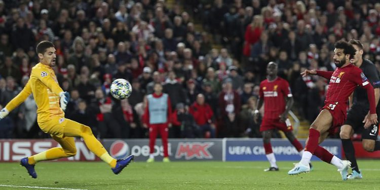 Mohamed Salah (right) shoots to score the winning goal against Salzburg, Wednesday