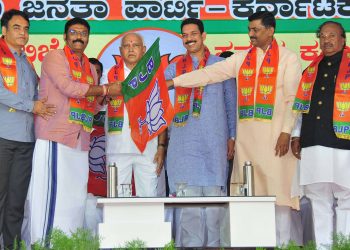 Disqualified Karnataka MLAs who joined the BJP, Thursday pose with Chief Minister BS Yediyurappa