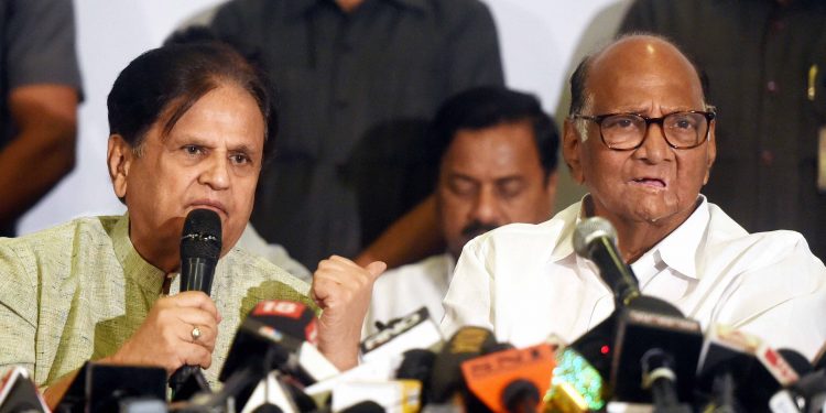 NCP chief Sharad Pawar (right) along with Congress leader Ahmed Patel during a joint press conference, in Mumbai, Tuesday