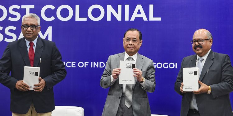 Chief Justice of India (CJI) Ranjan Gogoi,(centre) Justice Hrishikesh Roy (left) and author of book Mrinal Talukdar release a book titled Post Colonial Assam (1947-2019),  in New Delhi Sunday