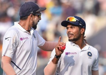 Fast bowlers Ishant Sharma (L) and Umesh Yadav have a lot to talk about after their show blew away the Bangladeshi batsmen at the Eden Gardens, Sunday