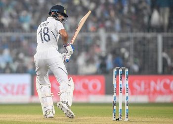 India's cricket team captain Virat Kohli plays a shot during the first day of the second Test cricket match of a two-match series between India and Bangladesh at the Eden Gardens cricket stadium in Kolkata on November 22, 2019. (Photo by Dibyangshu SARKAR / AFP) / IMAGE RESTRICTED TO EDITORIAL USE - STRICTLY NO COMMERCIAL USE
