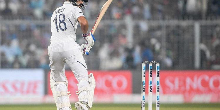 India's cricket team captain Virat Kohli plays a shot during the first day of the second Test cricket match of a two-match series between India and Bangladesh at the Eden Gardens cricket stadium in Kolkata on November 22, 2019. (Photo by Dibyangshu SARKAR / AFP) / IMAGE RESTRICTED TO EDITORIAL USE - STRICTLY NO COMMERCIAL USE