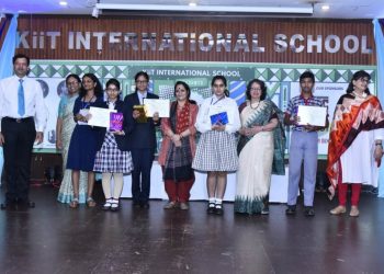 Winners of short story writing competition pose with their certificates