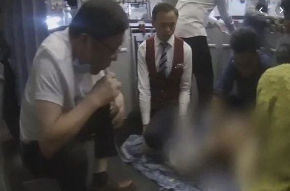 Doctor saves patient’s life on plane by sucking urine out of bladder