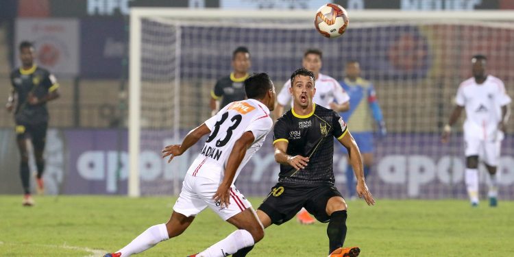 Marcelo Pereira of Hyderabad FC and Rakesh Pradhan of NorthEast United FC in action during the ISL game Wednesday