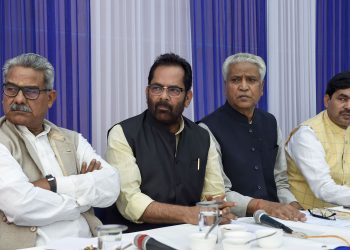 Union Minority Affairs Minister Mukhtar Abbas Naqvi (2nd Left) with RSS leader Ramlal (L) and others during a meeting, at his residence in New Delhi