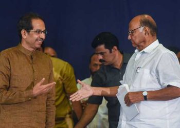 Uddhav Thackeray (left) and Sharad Pawar